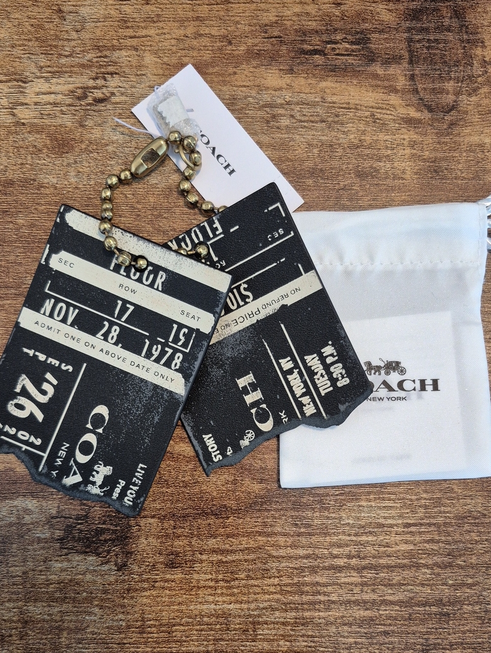 Coach Black Ticket-Print Leather Bag Charm with Gold Ball Chain